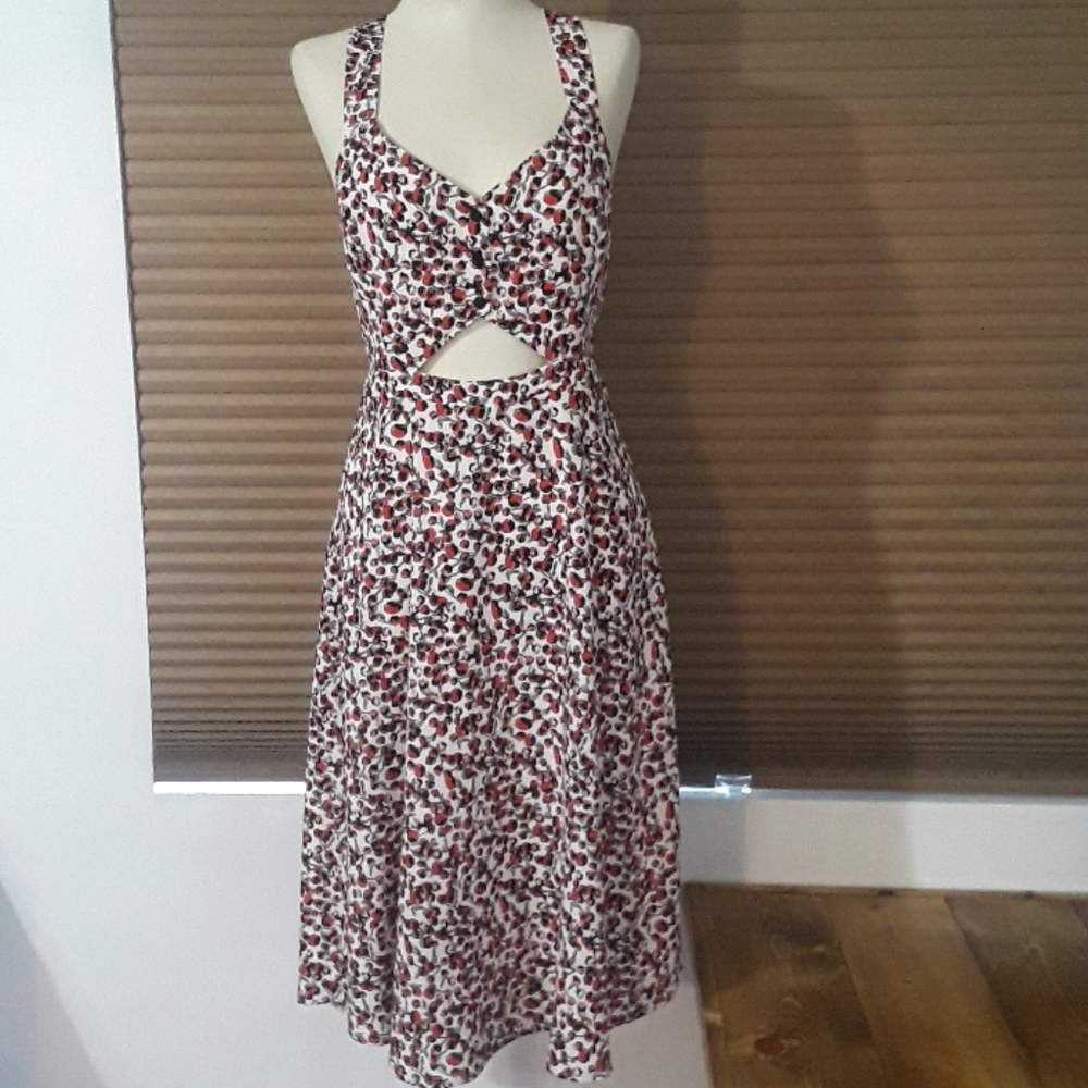 Cream dress with red flower print